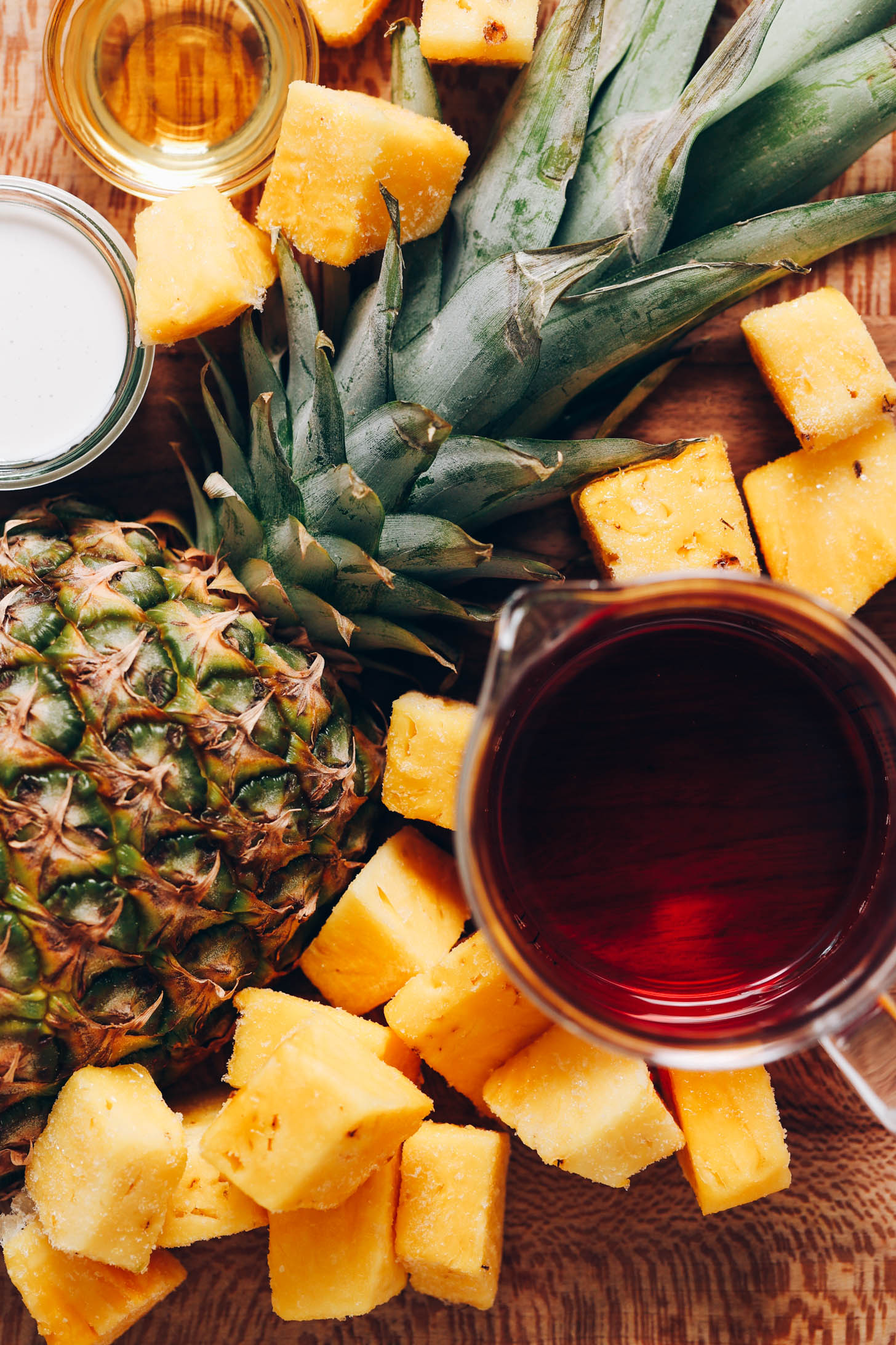 Fresh and frozen pineapple, coconut cream, agave, and coconut water