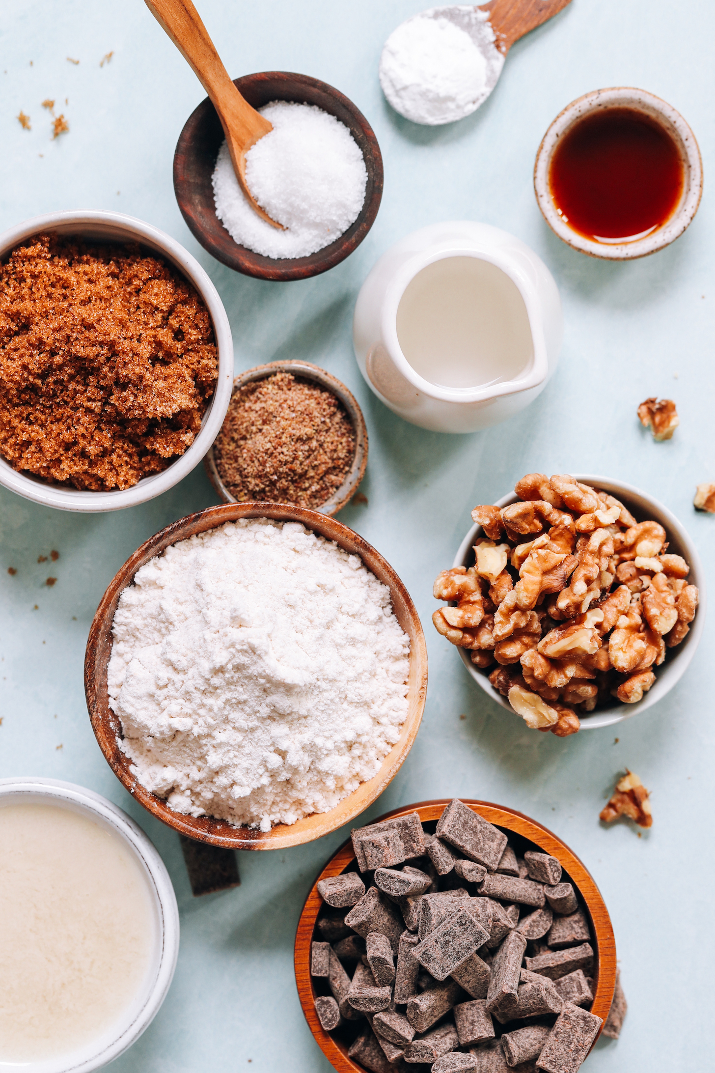 Dairy-free milk, gluten-free flour blend, brown sugar, flaxseed meal, salt, baking powder, vanilla, water, walnuts, and chocolate chips