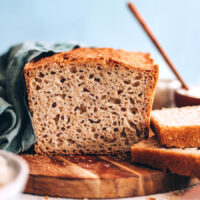 Partially sliced loaf of homemade gluten-free bread