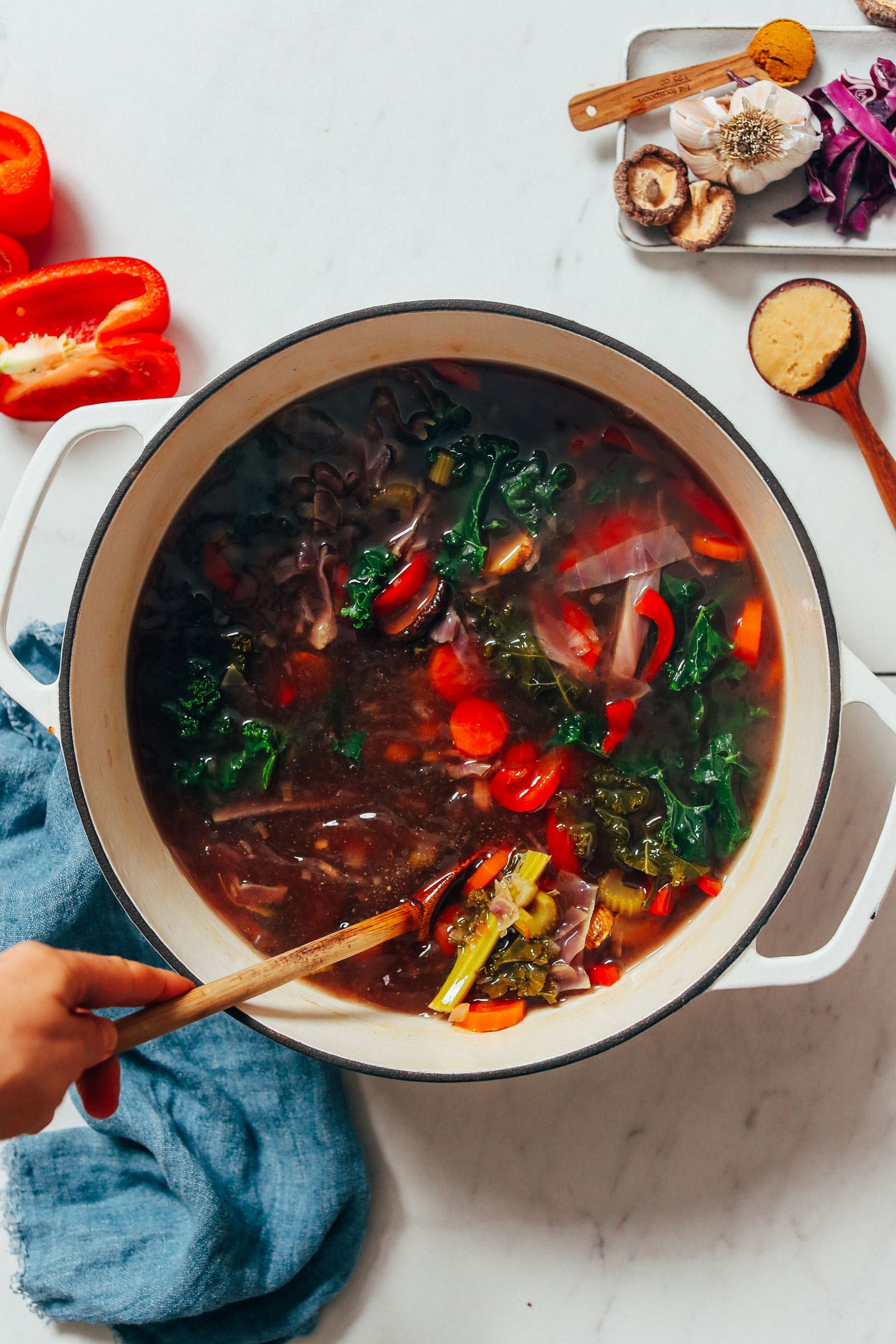 Dutch oven of vegetables boiled in water to make homemade broth