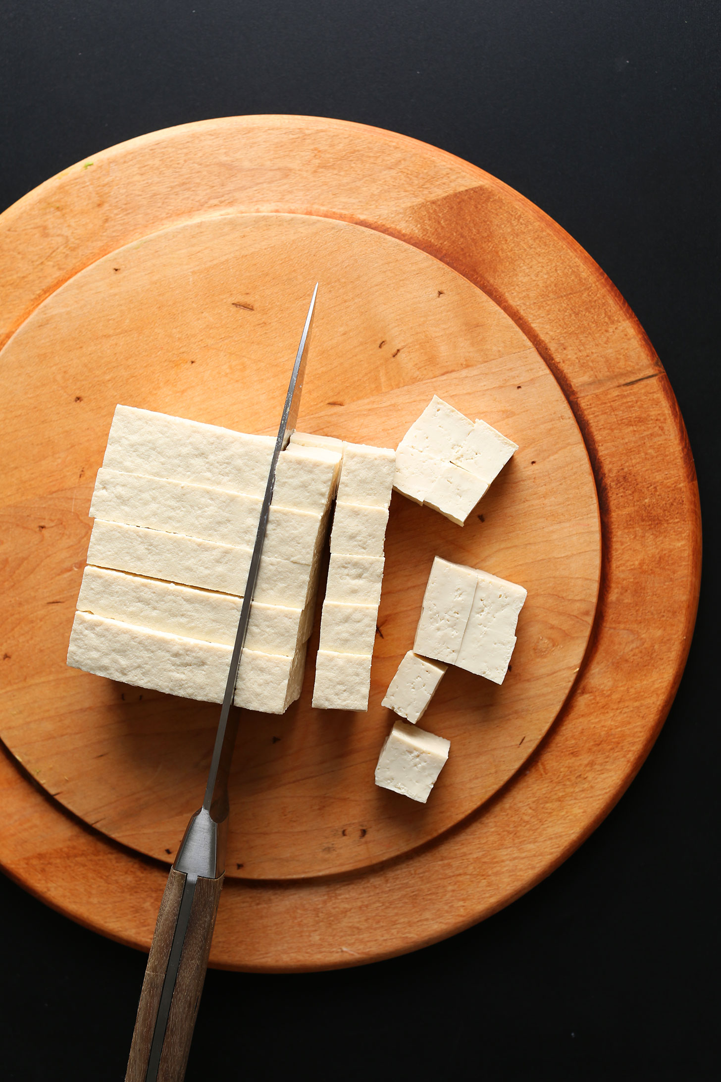 Showing how to cut tofu into cubes for easy Crispy Tofu